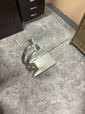 Modern End Table with Curved Silver Metal Base and Glass Top