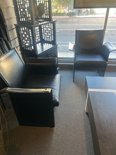 Modern Looking Pair Of Sintesi Chairs in Black Leather